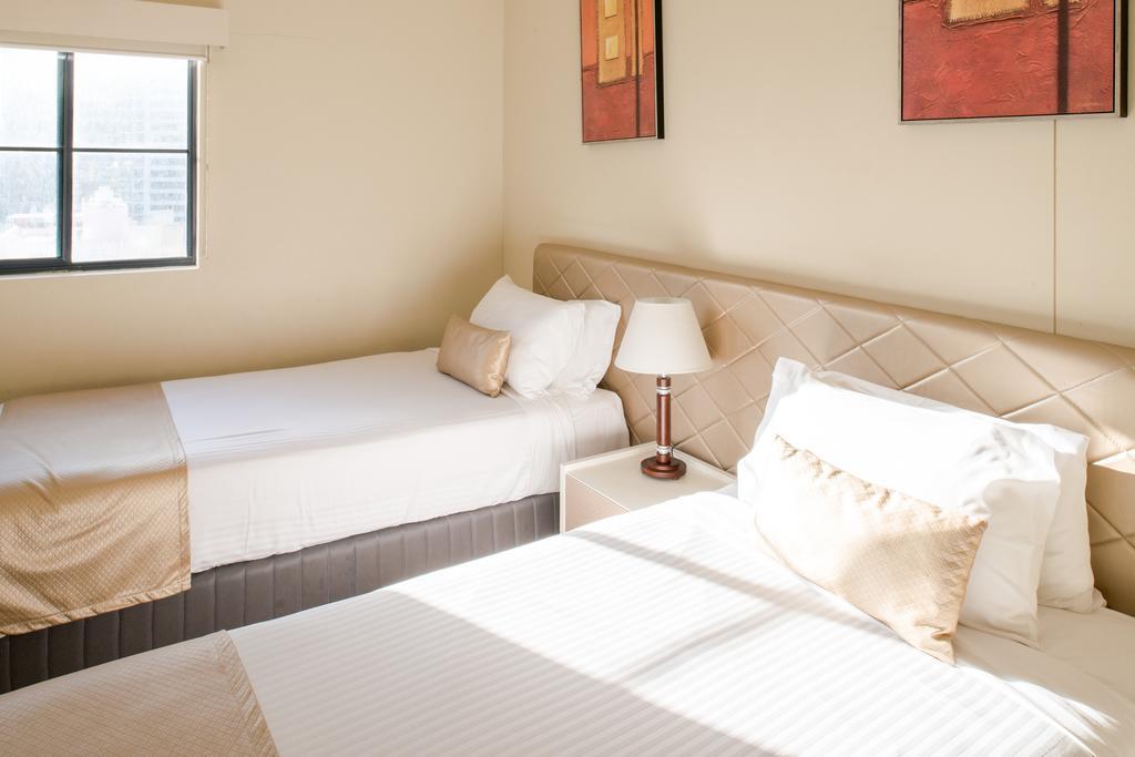 Aparthotel Seasons Harbour Plaza à Cité de Cité de Sydney Extérieur photo