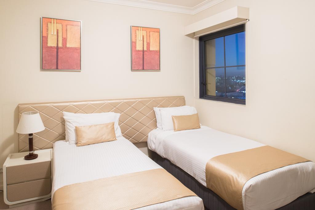 Aparthotel Seasons Harbour Plaza à Cité de Cité de Sydney Extérieur photo